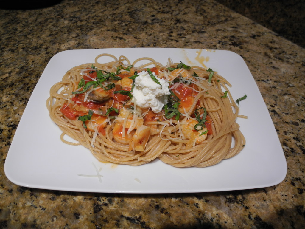 Whole wheat pasta with a spicy shrimp tomato and sweet vermouth sauce